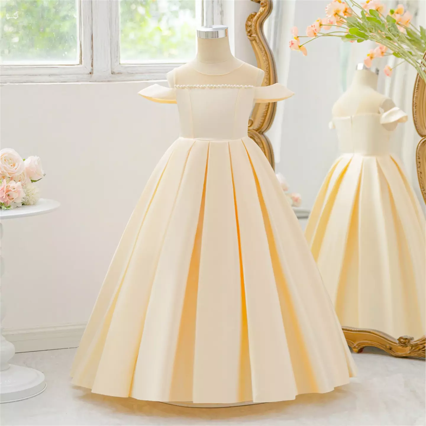 Yura Champagne Illusion Neckline Pearl Trim Tea Length Junior Bridesmaid Dress | Lucys
