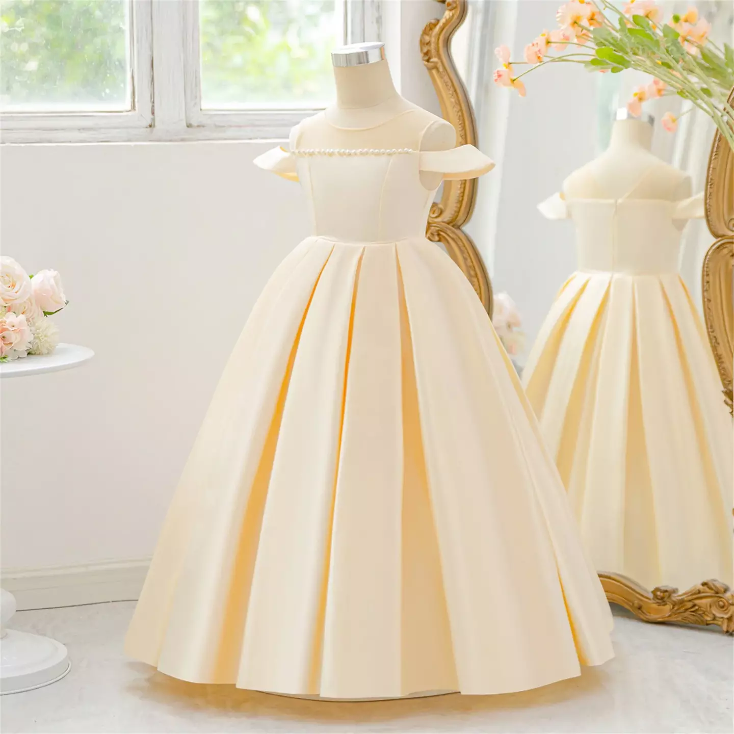 Yura Champagne Illusion Neckline Pearl Trim Tea Length Junior Bridesmaid Dress | Lucys