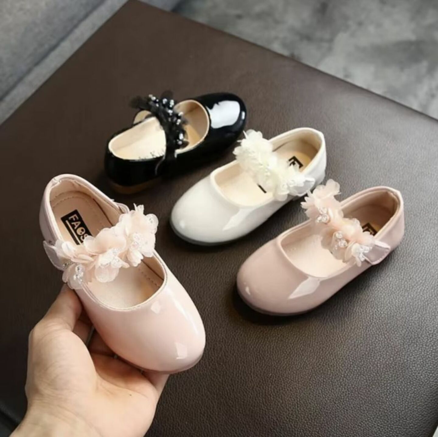 Baby, Toddler & Young Girls Black Patent Flower Strap Mary Jane Shoes | Lucys 10497