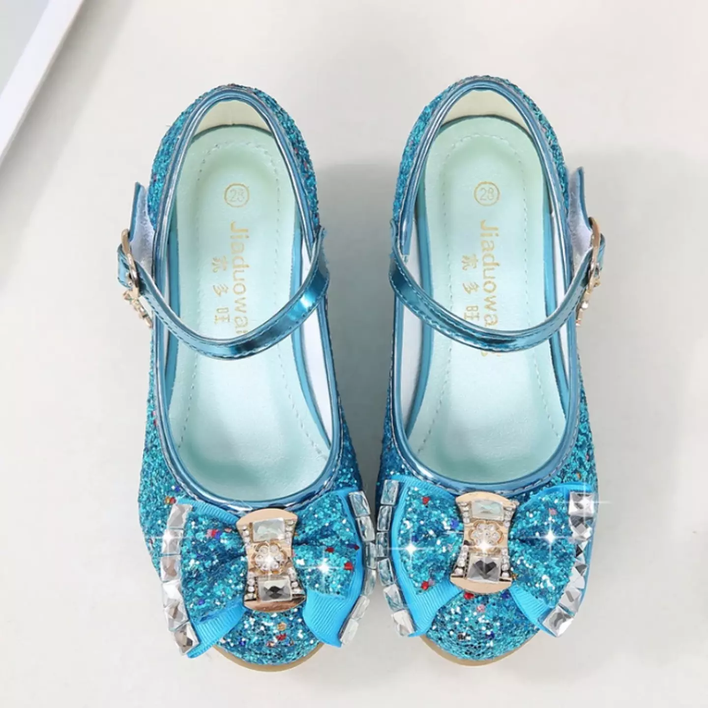 Young Girls & Girls Blue Baguette Stone Bow Charm Strap Dress Shoes | Lucys 11349